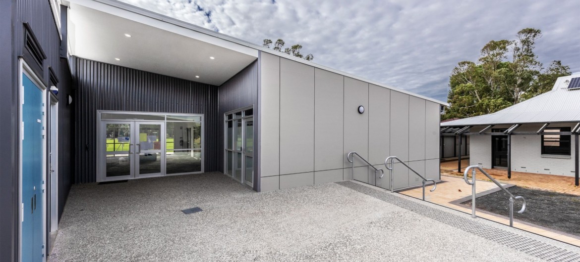 Exterior Modular School Building with Corrugated Steel Cladding and Grey Panelling