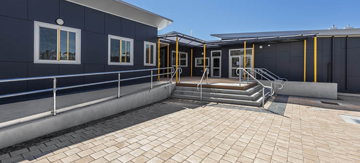 Exterior Classroom Block with Tile Pavers, Concrete Ramp and Stairs