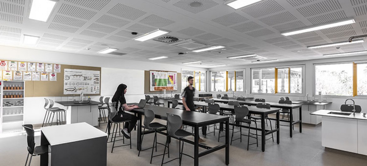 Interior Science Classroom with Communal Desks and Chairs