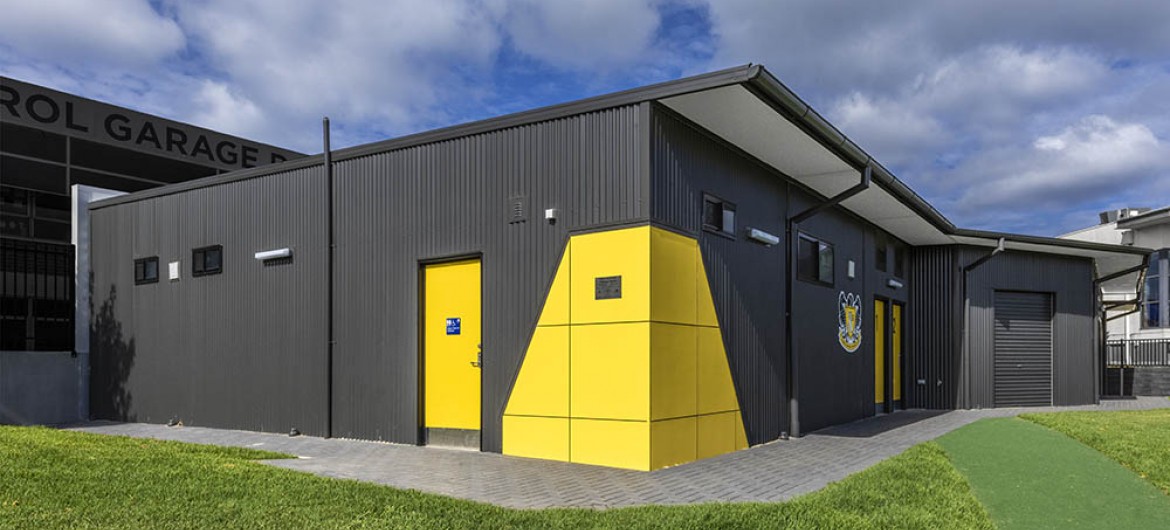 Exterior Toilet Block with Corrugated Steel Cladding and Yellow Panelling and Doorsfacilities